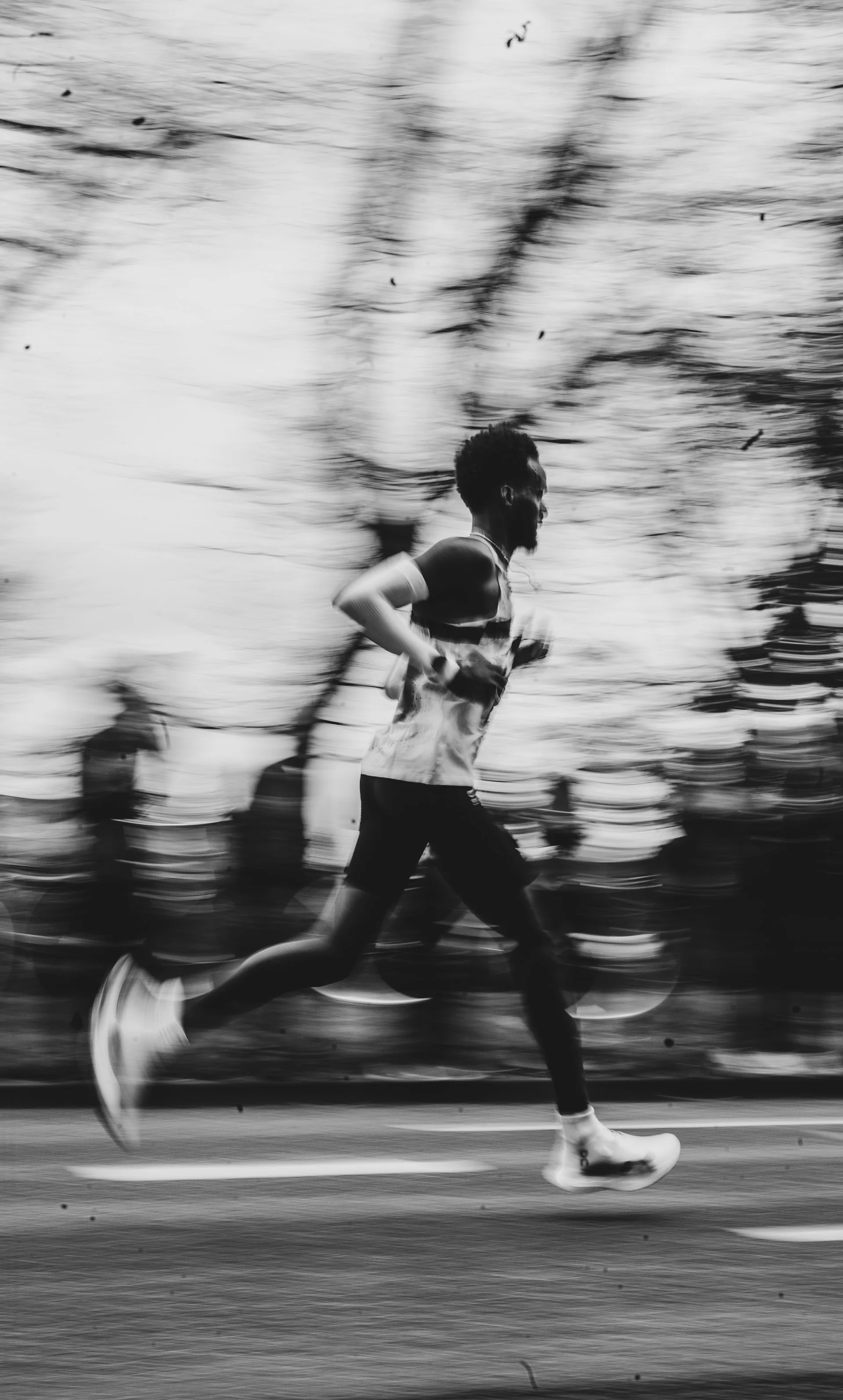 Runner mid-stride during an interval session