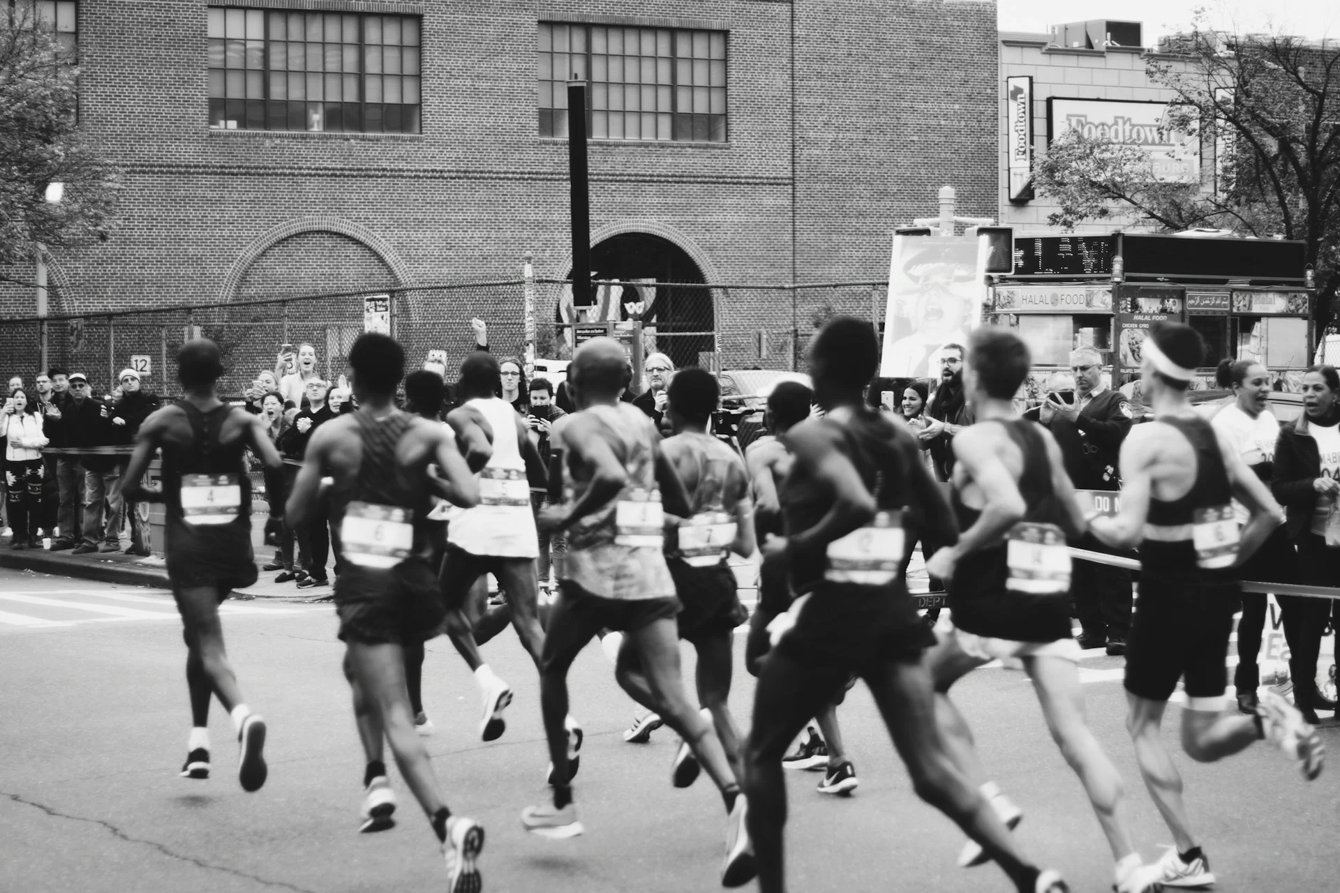 Runners packed together early in a city race